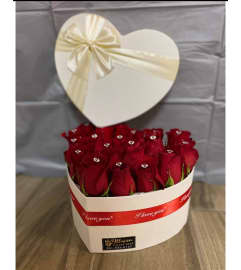 with all my heart box. An arrangement by Illusion Flower Shop.