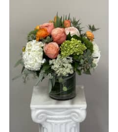 Peach Blossom Delight. An arrangement by Bill's Flowers Arrangements.