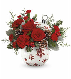 Sparkle All The Way Bouquet (Teleflora). An arrangement by North Liberty Flower Shop.