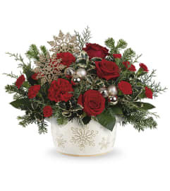 Snowflake Symphony (Teleflora). An arrangement by North Liberty Flower Shop.