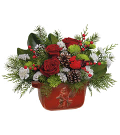 Classic Cardinal Centerpiece (Teleflora). An arrangement by North Liberty Flower Shop.