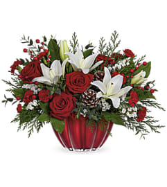 Vibrant Christmas centrepiece. An arrangement by Big Event Floral and Decorating Co.. Vibrant Christmas centrepiece. An arrangement by Big Event Floral and Decorating Co..