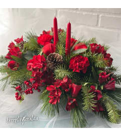 Red Christmas Centrepiece with or without Chocolate. An arrangement by Brooklin Floral and Garden Shoppe Inc..