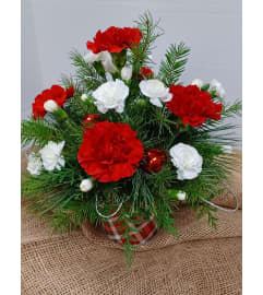 Deck the Holidays. An arrangement by Zaisers Florist and Greenhouse.