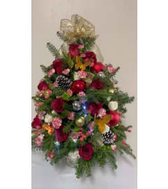 Christmas Tree with Lights. An arrangement by Dream Decorations Florist.