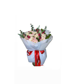 An unusual bouquet of carnations with the addition of green ears. An arrangement by Mary Flowers Decor.