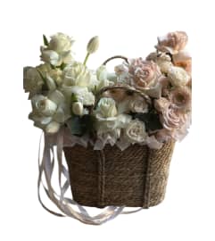 Basket of spring flowers. An arrangement by Mary Flowers Decor.