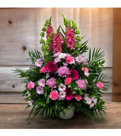 Pink Hearts Tribute. An arrangement by DMP Flowers and Gifts.