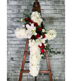 Elegant Blooms of Comfort Cross. An arrangement by DMP Flowers and Gifts.