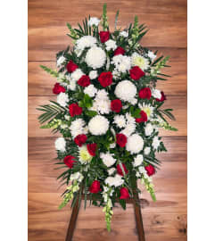 Elegant Blooms of Comfort Standing Spray. An arrangement by DMP Flowers and Gifts.