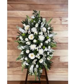 Classic Farewell Standing Spray. An arrangement by DMP Flowers and Gifts.