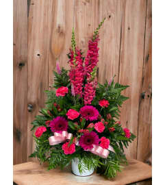 Hot Pink Tribute. An arrangement by DMP Flowers and Gifts.