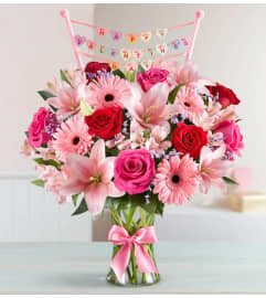 Field of Europe Romance with Banner. An arrangement by Palmetto Gardens Florist.