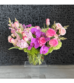 Enchanting Elegance by Twigs and Blooms. An arrangement by Twigs and Blooms Florist.