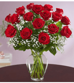 Rose Elegance Premium Long Stem Red Roses. An arrangement by Susana's Flowers.