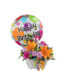 Happy Blooms Basket ™ FTD®. An arrangement by Grower Direct.