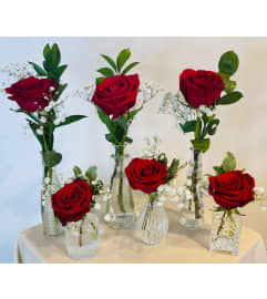 Red rose bud vase collection. An arrangement by Flowerville.