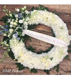 Timeless. An arrangement by DMP Flowers and Gifts.