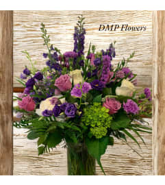 Impress Them. An arrangement by DMP Flowers and Gifts.