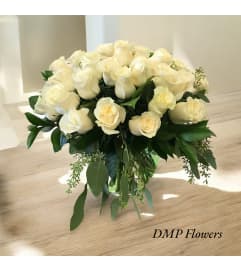 Yours truly. An arrangement by DMP Flowers and Gifts.