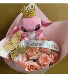Stitch bouquet. An arrangement by Conny's Flower Shop.