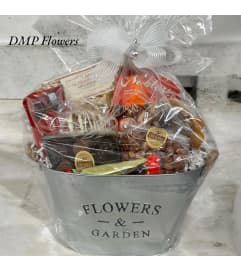 Medium gourmet goodie basket. An arrangement by DMP Flowers and Gifts.