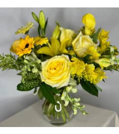 Sunny delight!. An arrangement by Flowerville.