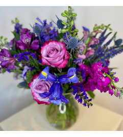Royal purples. An arrangement by Flowerville.