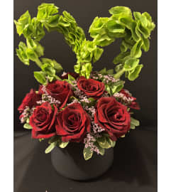 Heartfelt Romance. An arrangement by Bill's Flowers Arrangements.