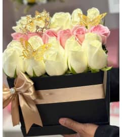 Elegant box. An arrangement by Illusion Flower Shop.