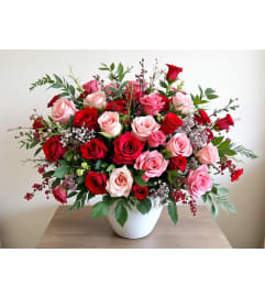 Love's Adornment. An arrangement by L and J Blooms.