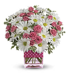 Polka Dots and Posies. An arrangement by Conny's Flower Shop.