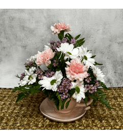 Tea Cup Love. An arrangement by Love Floral.