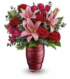 Loving Swirls Bouquet. An arrangement by Flowers of Jacksonville.