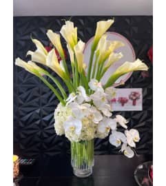 Elegant White Harmony. An arrangement by Hialeah Flowers.