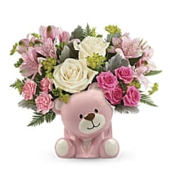 Teleflora's Precious Pink Bear Bouquet. An arrangement by Love Floral.