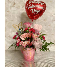 Cup of Love. An arrangement by Kelly Ann's Floral.
