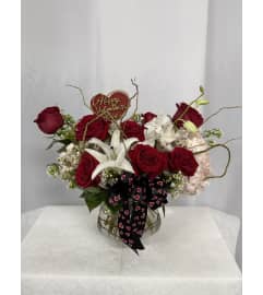 Red Hot Romance. An arrangement by Commerce Flowers.
