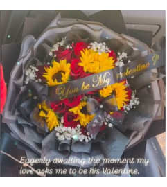 Golden Glow Romance. An arrangement by Geni's Florist and Gifts.