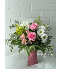 Splash of Rosé. An arrangement by Brooklin Floral and Garden Shoppe Inc..