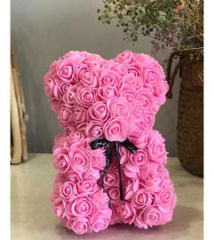Hot pink rose foam bear. An arrangement by Lake Eola Florist.