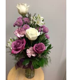 Violet Passion. An arrangement by Roma Flowers and Gifts.