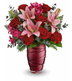 Swirling Embrace Bouquet. An arrangement by Margaret's Florist.