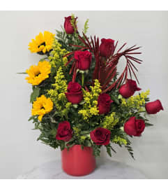 Passionate Radiance. An arrangement by Rosebud Studio Florist.