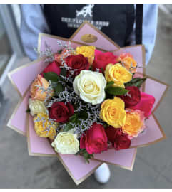 18 Long-stemmed Mixed Premium Rose Bouquet. An arrangement by The Flower Shop in the Village.