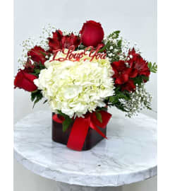 Endless Love Centerpiece. An arrangement by Rosebud Studio Florist.
