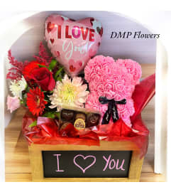 Love box. An arrangement by DMP Flowers and Gifts.