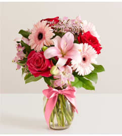 FIELDS FOR ROMANCE. An arrangement by J.D. Ballantine's Flowers and Gifts.