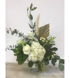 Timeless White Harmony. An arrangement by Floral Factory.