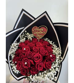 Scarlet Embrace. An arrangement by M's Flowers.